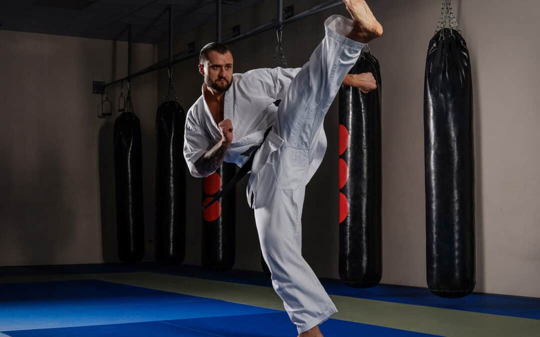 Karate fighter practicing martial arts in a fight club